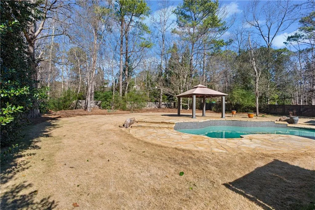 Large level backyard - plenty of room for play set, greenhouse, or gardens.