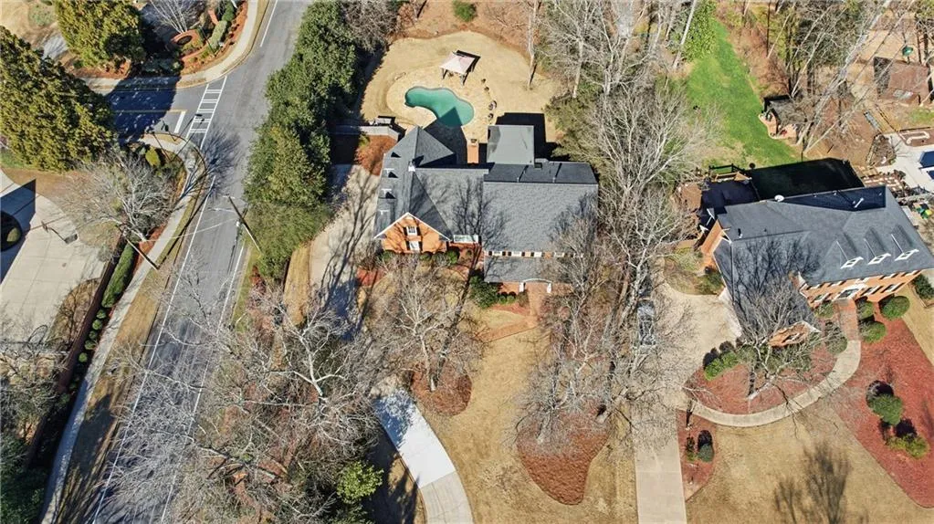 Large level lot with natural backyard privacy.