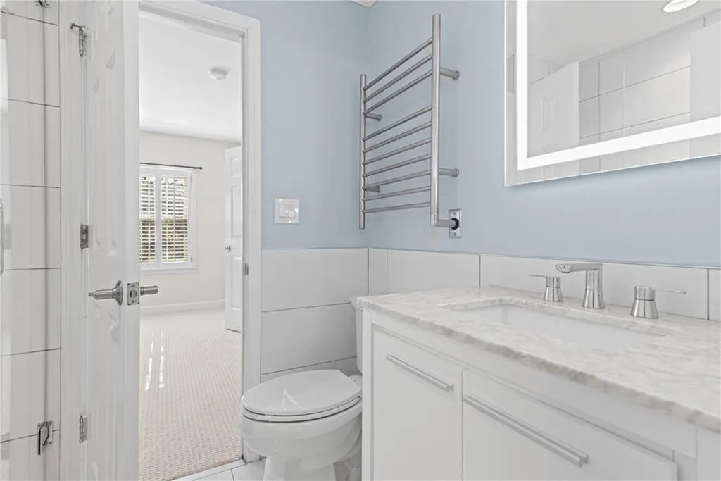 jock n jill bathroom for 2 secondary bedrooms upstairs complete with towel warming rack