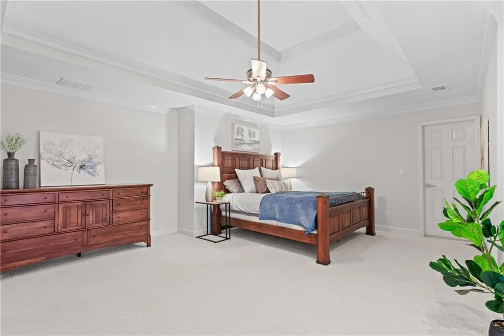 Large Primary new carpet, new paint and deep trey ceiling.