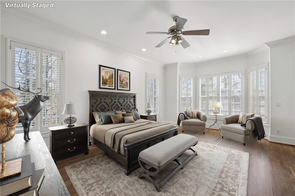 Bedroom with crown molding, wood finished floors, a ceiling fan, and recessed lighting
