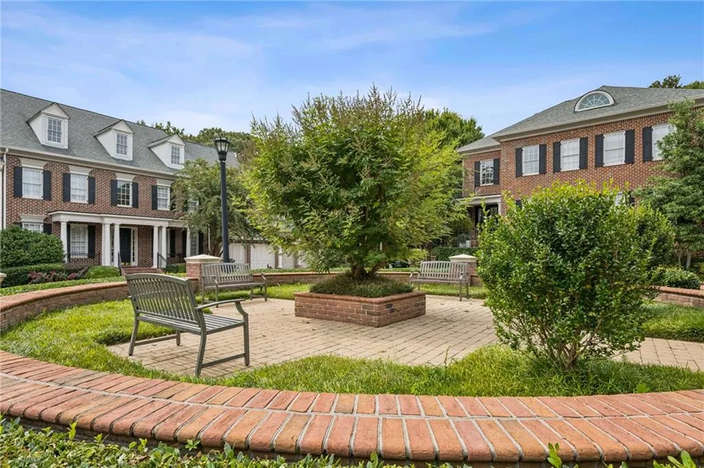 Surrounding community with a patio area