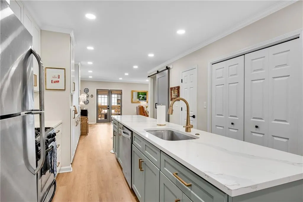 Kitchen features quartz cabinetry