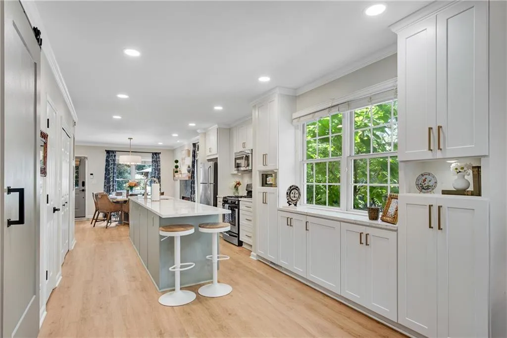 Kitchen opens to both dining and living room