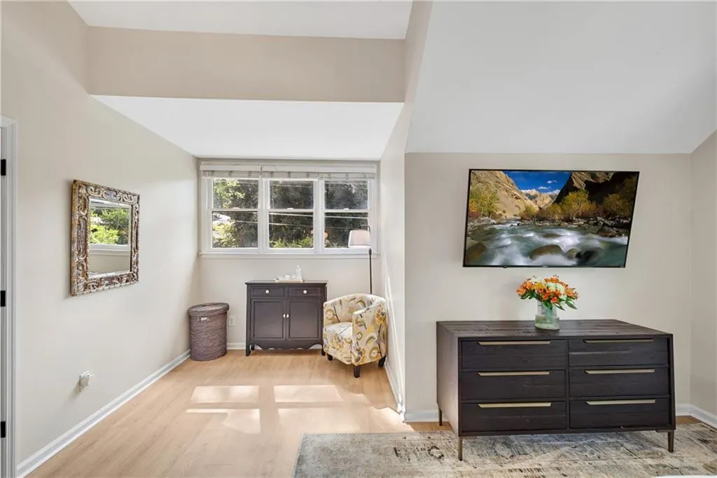 Primary bedroom with room for sitting