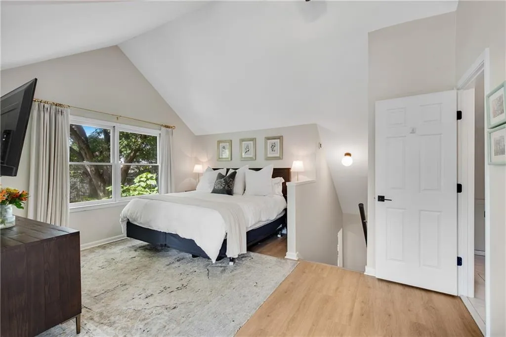 Primary suite with vaulted ceilings
