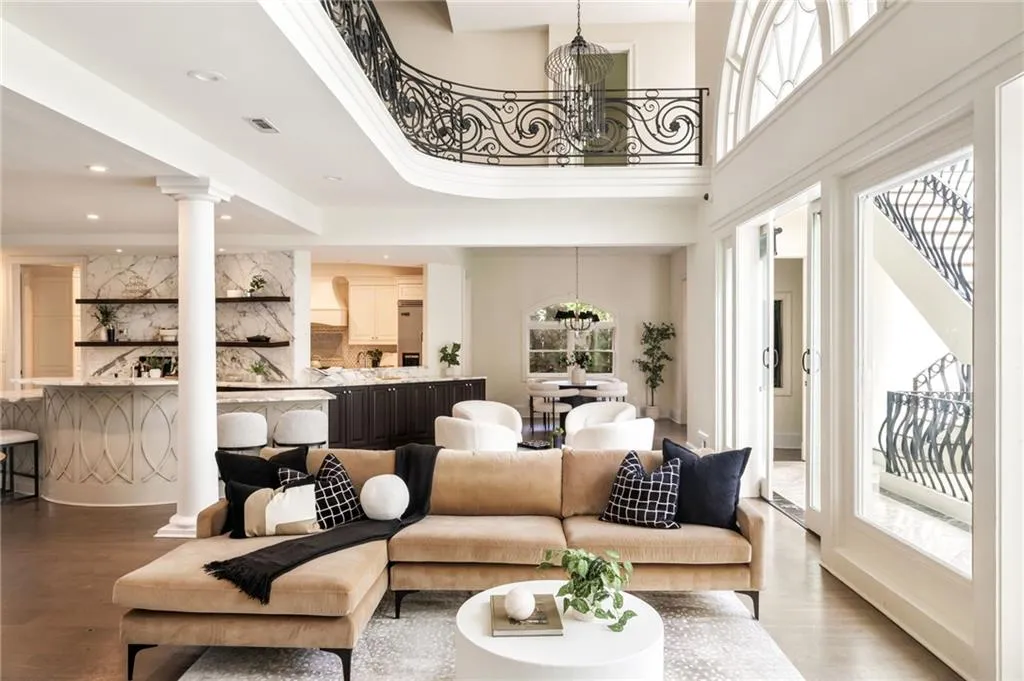 Lobby featuring recessed lighting and a towering ceiling