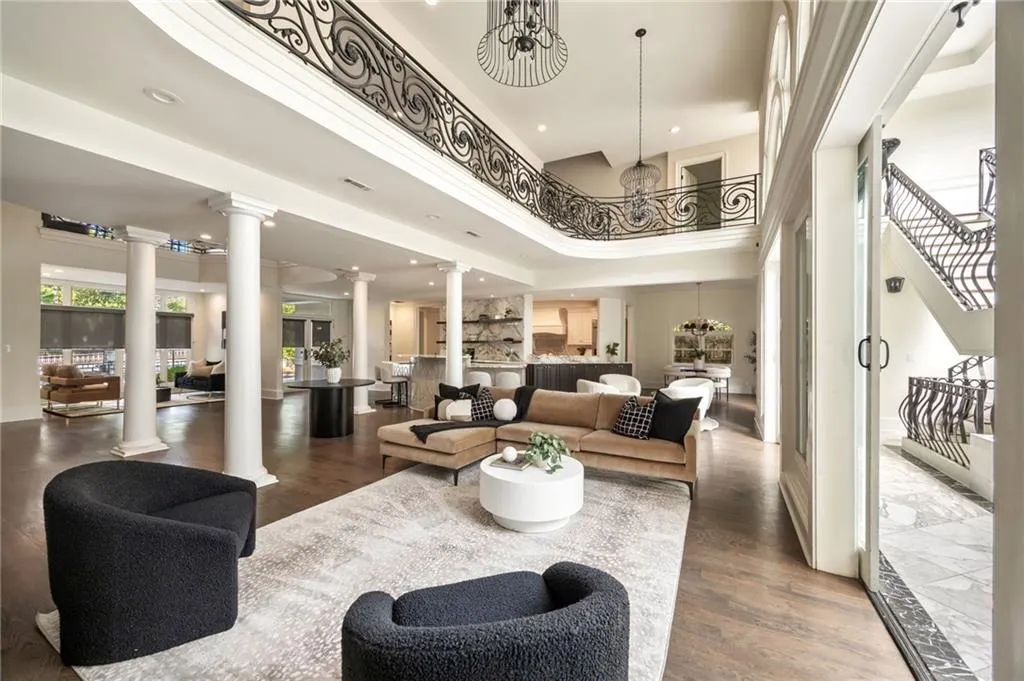 Common area with stairway, recessed lighting, and a high ceiling