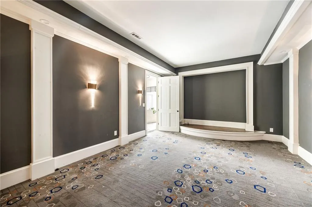 Unfurnished room featuring baseboards