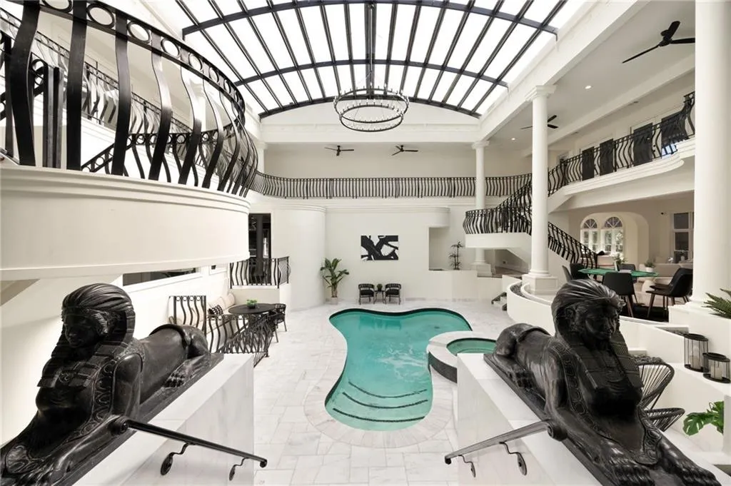 View of pool featuring a pool with connected hot tub