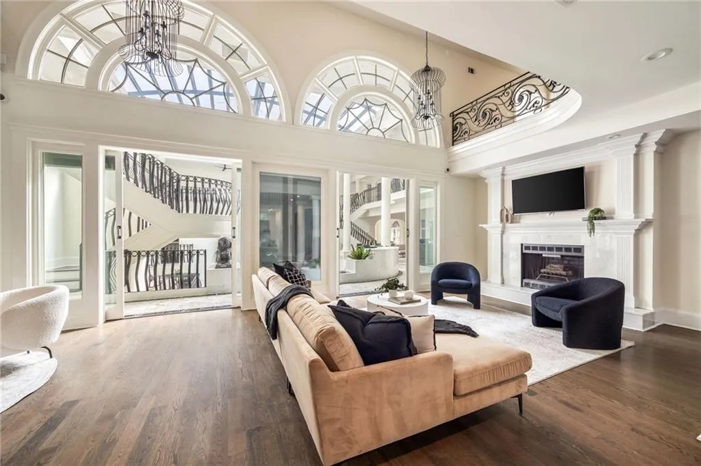 Sunroom / solarium with a chandelier