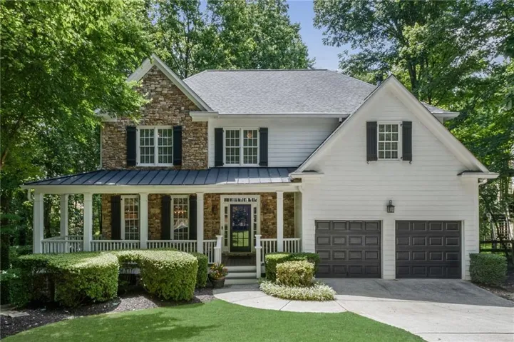Welcome Home! Beautiful elevation and design details in this charming 4+ bedroom Roswell home.