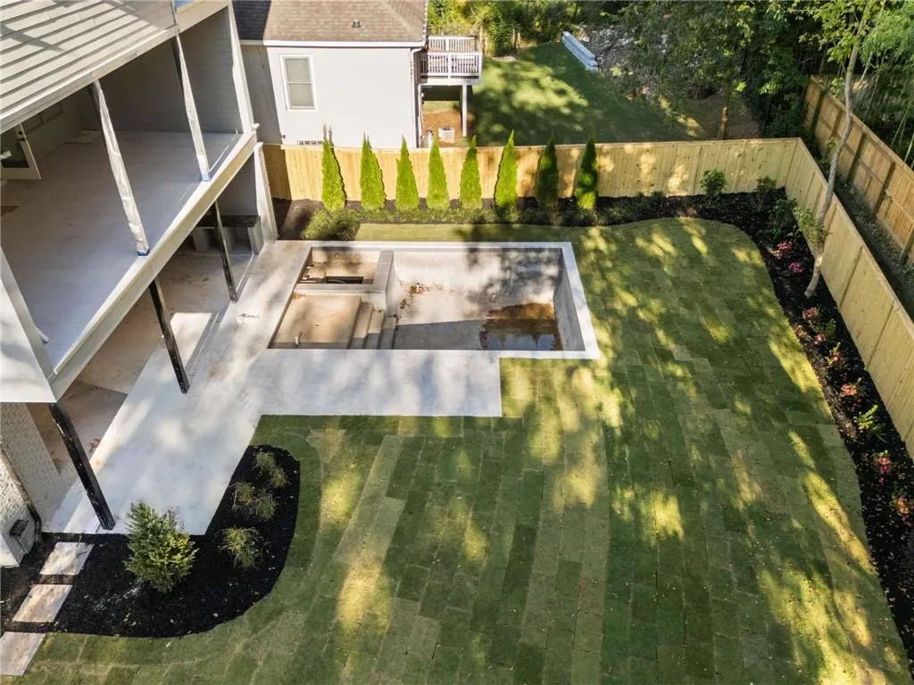 View of fenced backyard