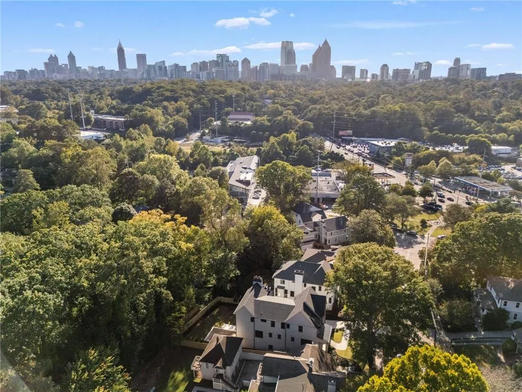 Aerial view of property and surrounding area with skyline