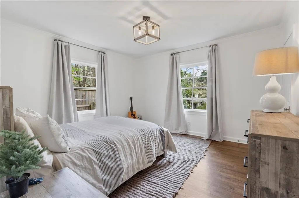 Two additional bedrooms share hall bathroom