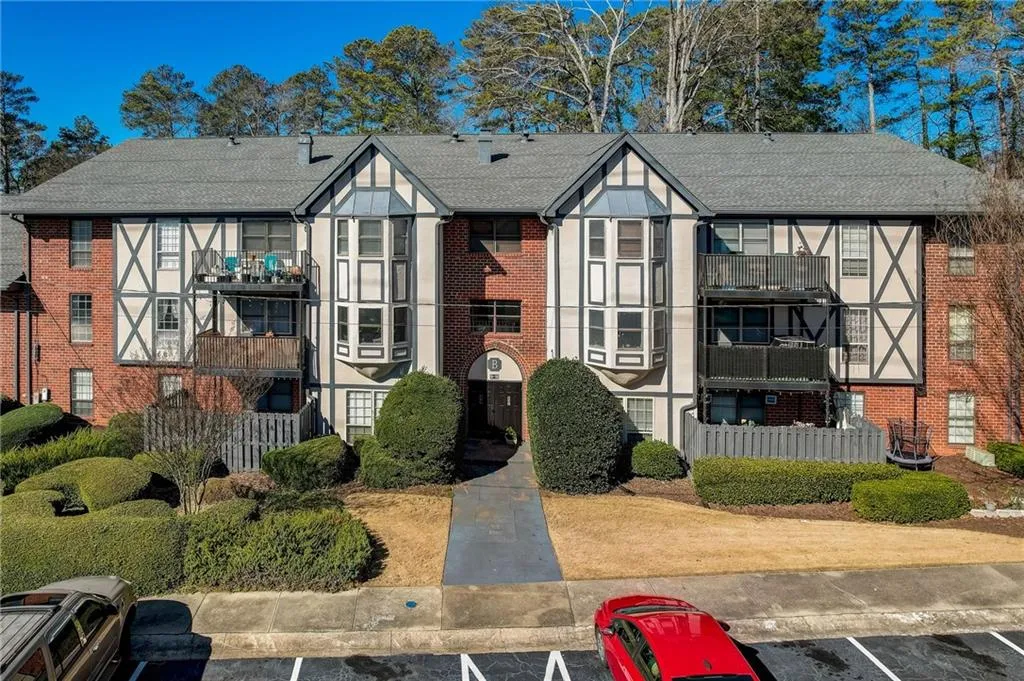 View of front of home featuring a balcony