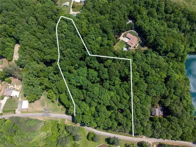 Private 6.18-acre wooded lot with creek frontage and multiple potential homesites in desirable Canton. Perfect opportunity to build your dream home!