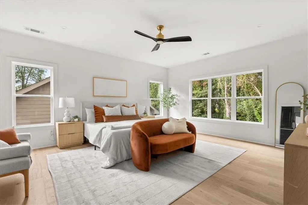 Bedroom featuring light wood-type flooring and ceiling fan