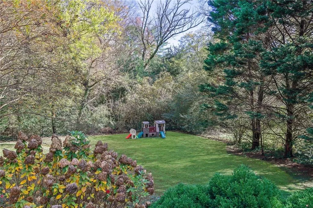 View of yard with a playground