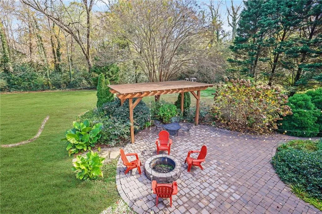 View of patio / terrace featuring an outdoor fire pit