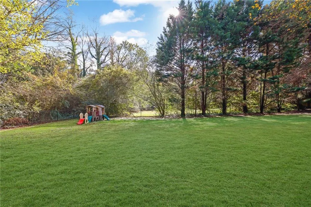 View of yard with a playground