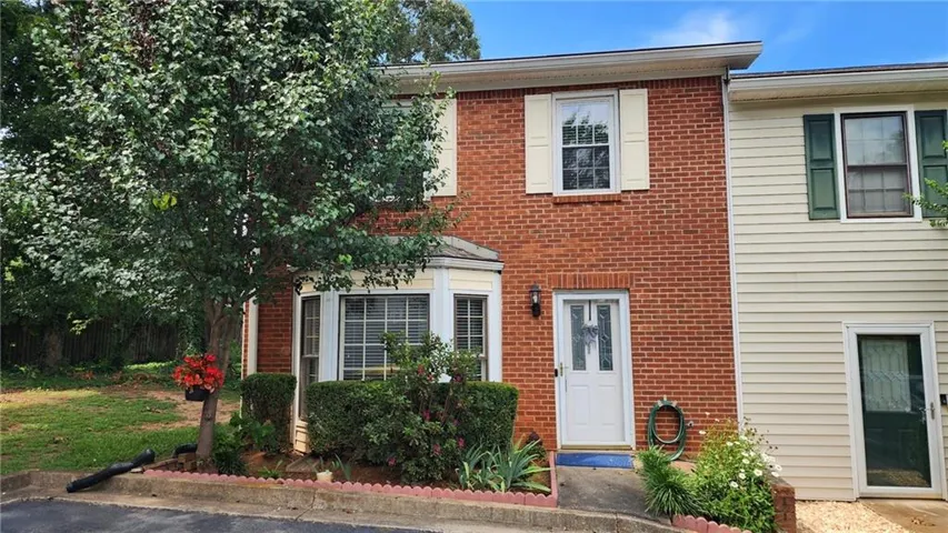Welcome home to easy living in the heart of East Cobb! This beautifully updated 2 BR, 2.5 BA condo offers newer windows, stylish LVP flooring, granite countertops, a cozy gas fireplace, and the refrigerator is included!