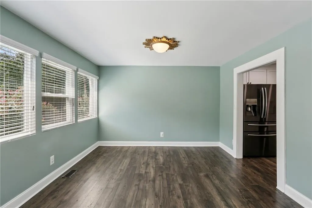 Dining room with hardwood floors.