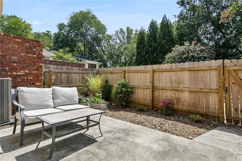Terrace level patio.  Community pool is right out the back gate.