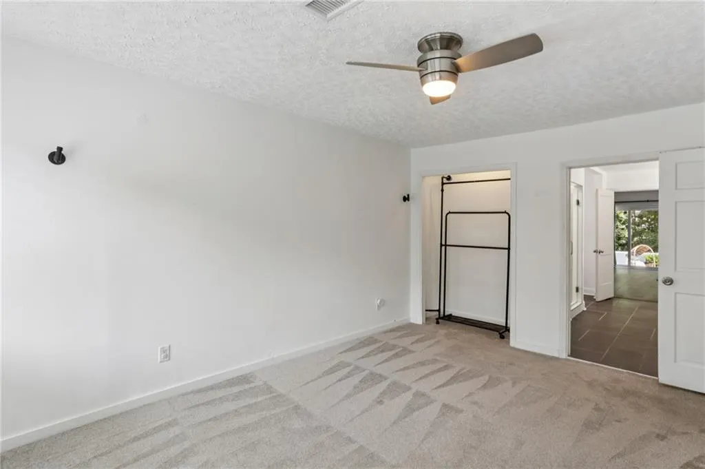 Second bedroom adjacent to the master suite.