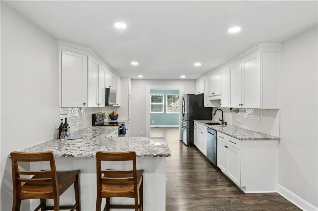 Another view of the kitchen looking towards the dining room.