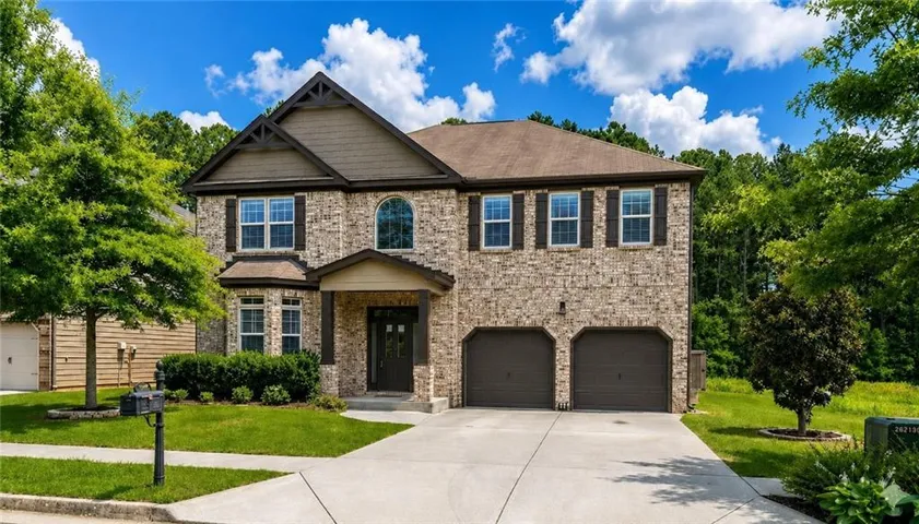 Beautiful two story home with lush landscaping