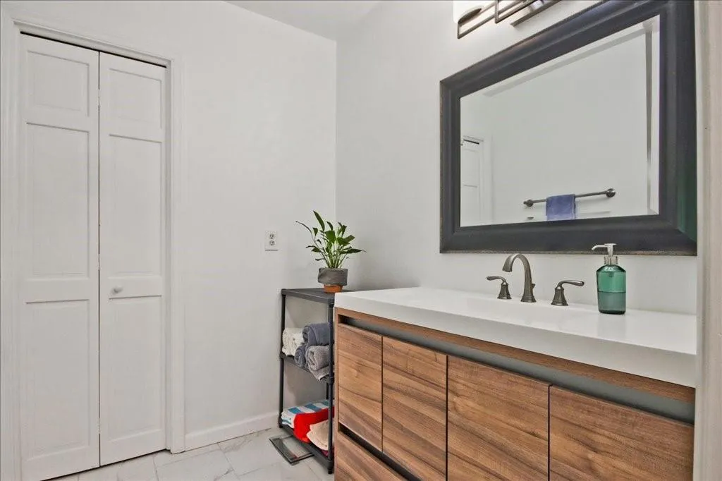 Bathroom with tile floors and vanity