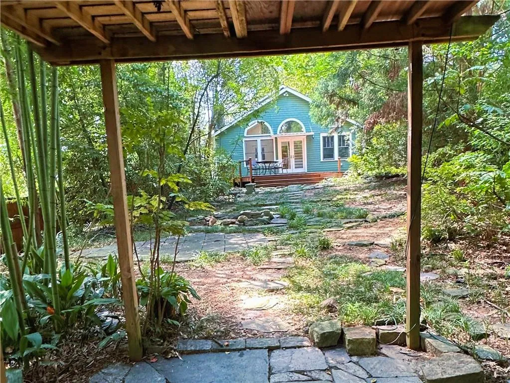 View of patio / terrace with french doors and a wooden deck