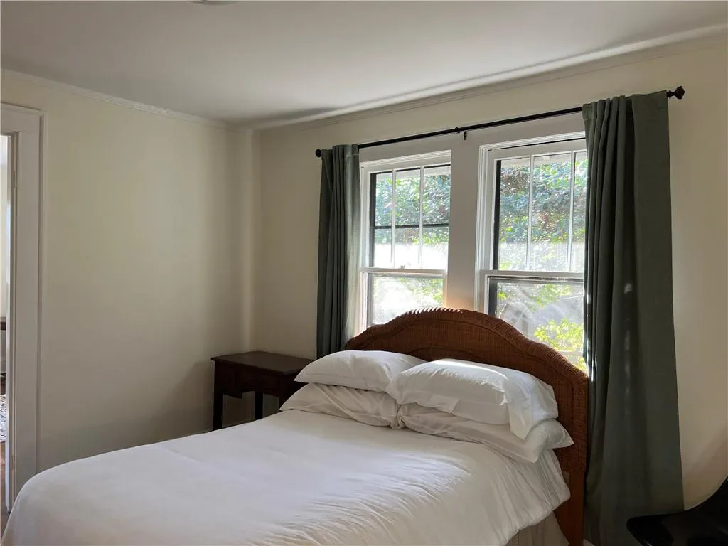 Bedroom featuring ornamental molding