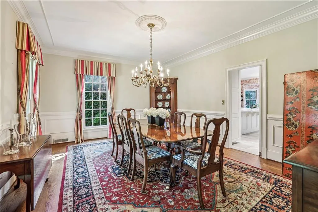 Opens to kitchen.  Notice large windows!