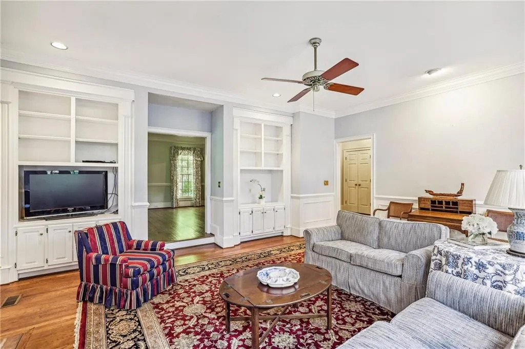 Family room showing openings to dining room (pocket doors) and hallway.
