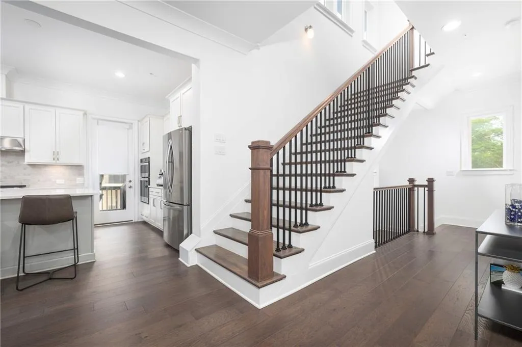 Steps from main floor living up to master suite and additional bedroom/bathroom