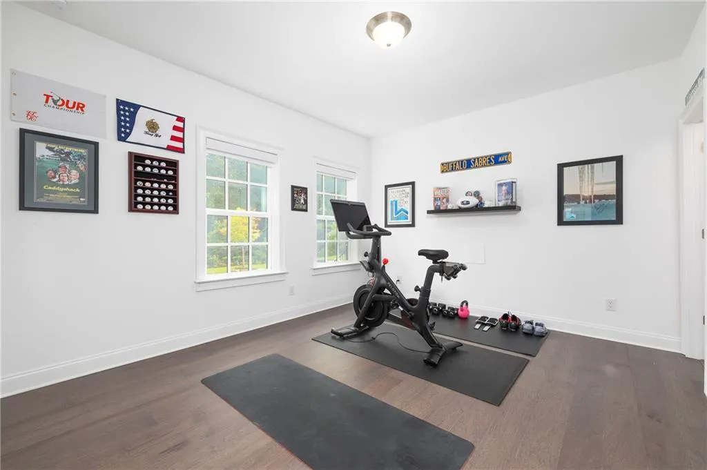 Terrace level bedroom with private en-suite bath currently being used as a private home gym