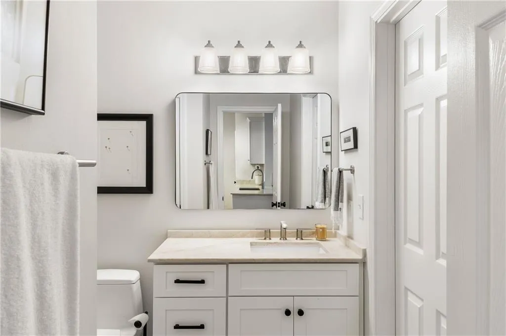 Bathroom featuring toilet and vanity