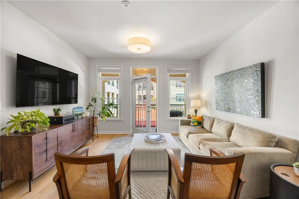 Living room featuring light wood-style flooring