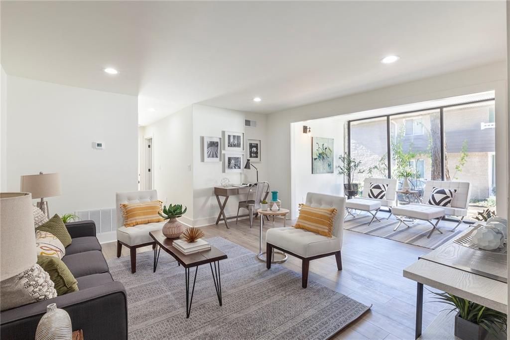 Living room with floor to ceiling windows