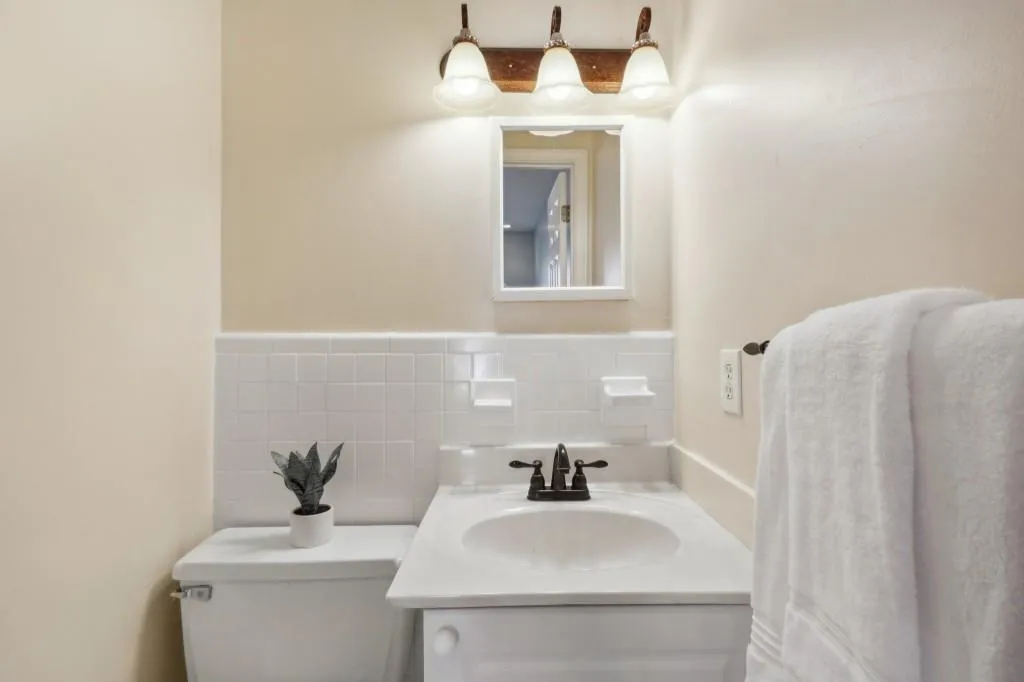 Half Bathroom In First Bedroom