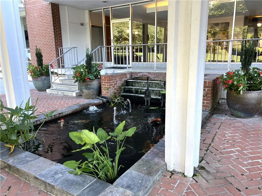 Koi pond to enjoy while sitting on the park bench and relaxing