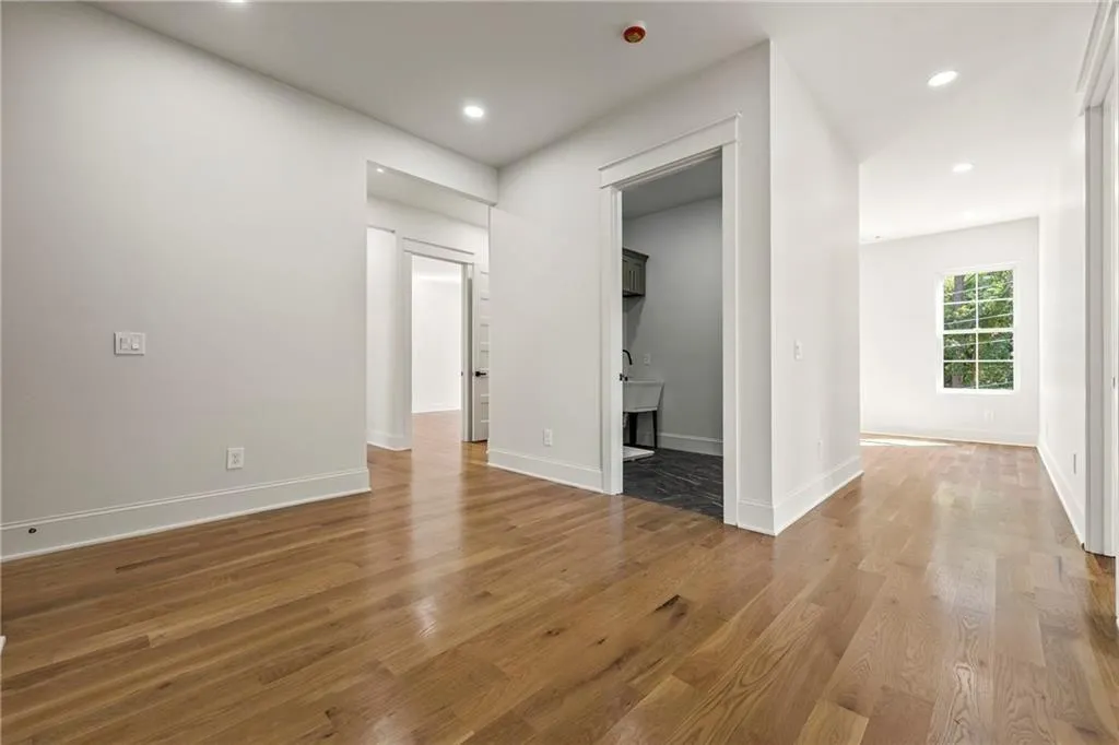 View of the laundry room of the second level hallway