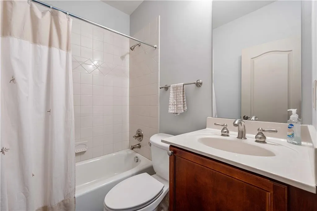 This lovely 3rd full bathroom is located in the basement
