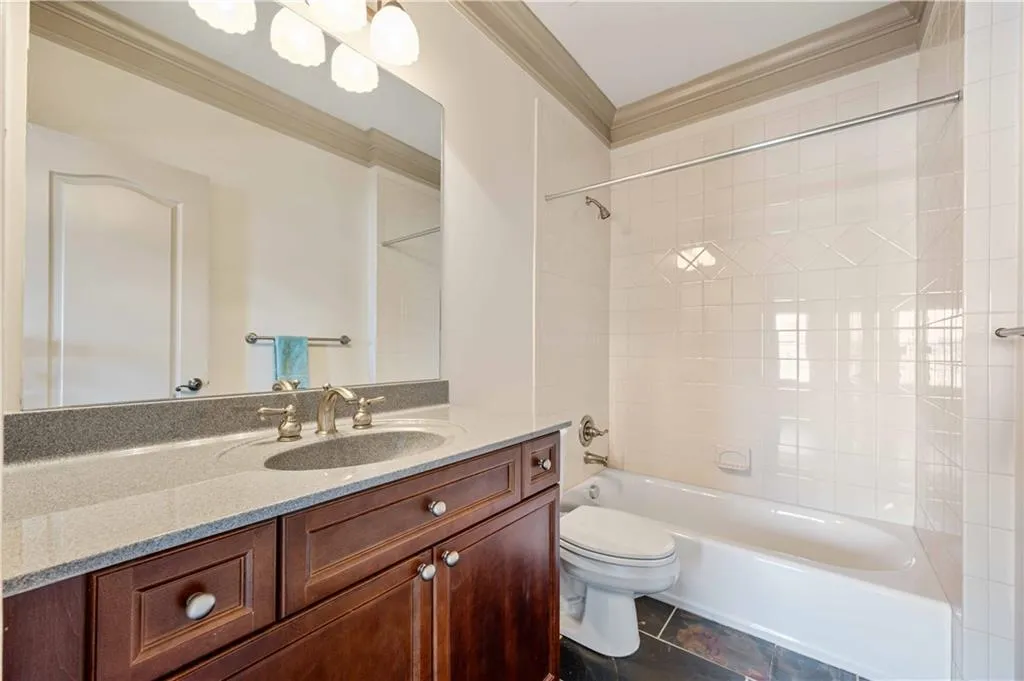 Secondary bathroom in the upstairs secondary bedroom. Lots of space for your guests, roommate, kiddos, parents.... Or maybe this becomes your home office...?