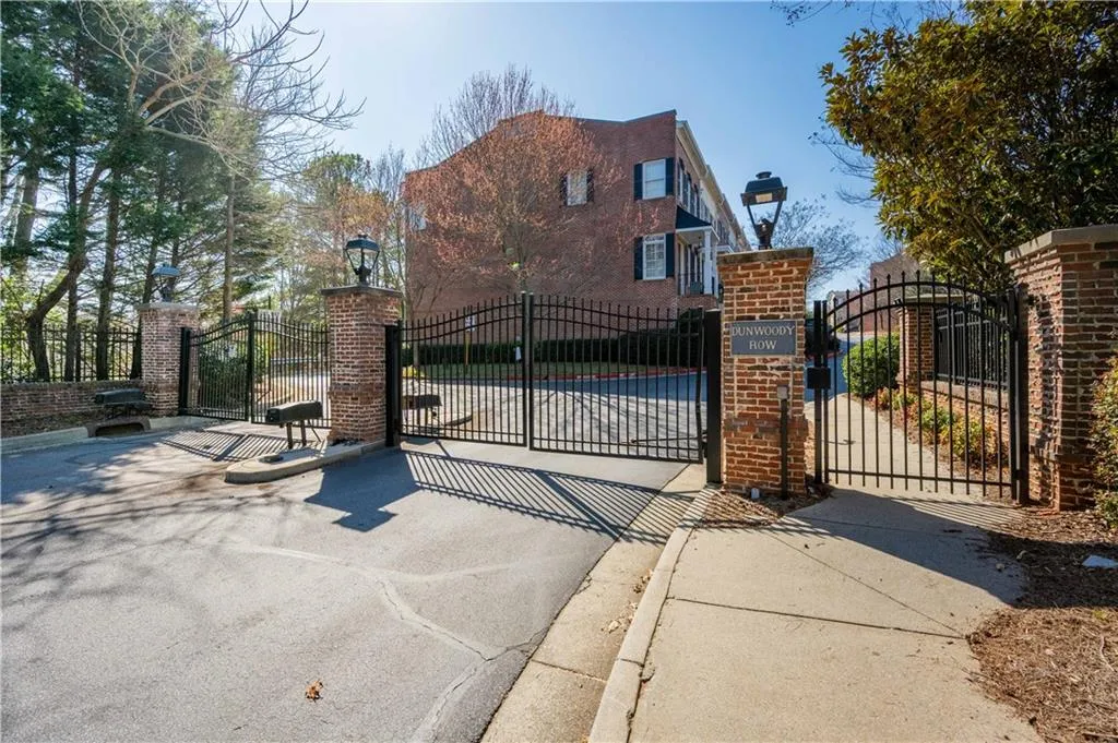 Lovely community entry gate adds security around the clock and looks nice when pulling in for yourself or guests!