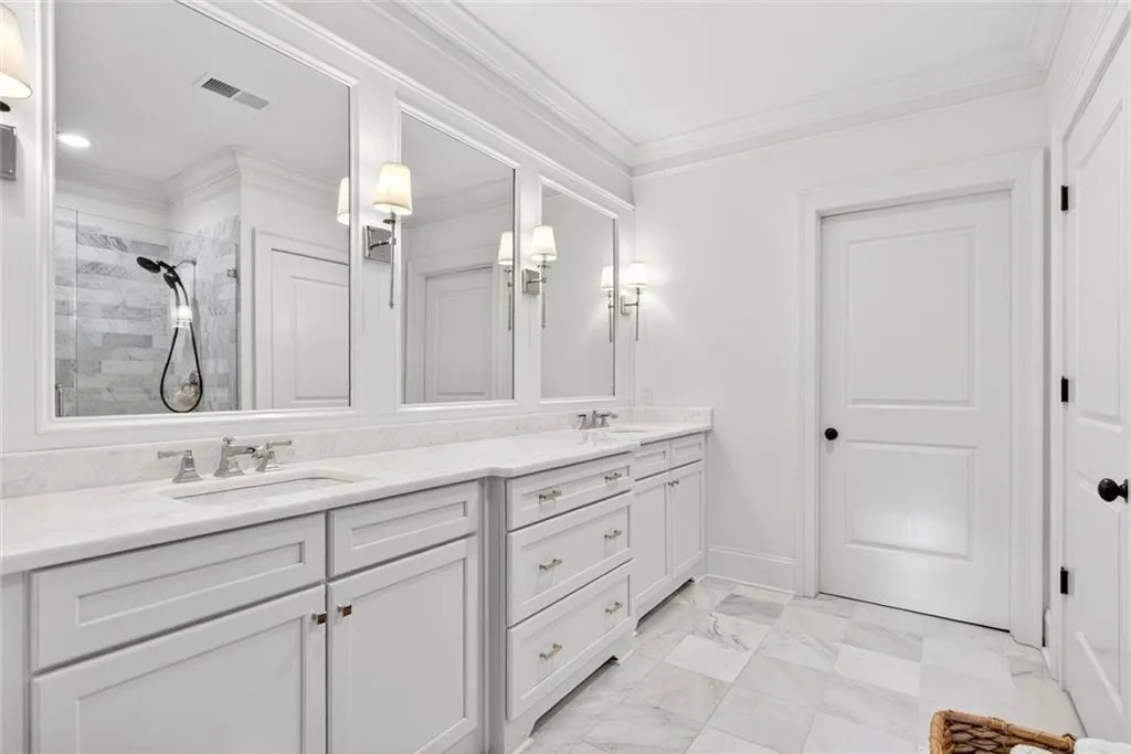 Stunning primary bath with 2 walk-in closets
