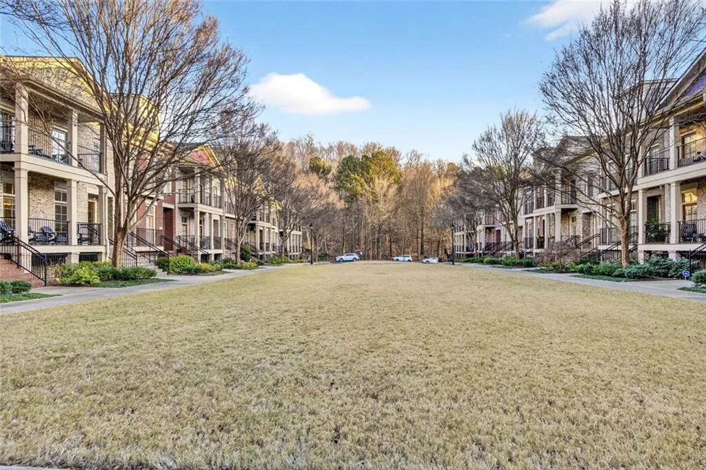 Beautiful greenspace just outside your front door and guest parking just steps away