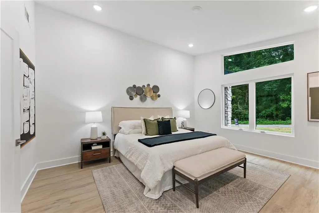 Bedroom with recessed lighting and light wood-style flooring